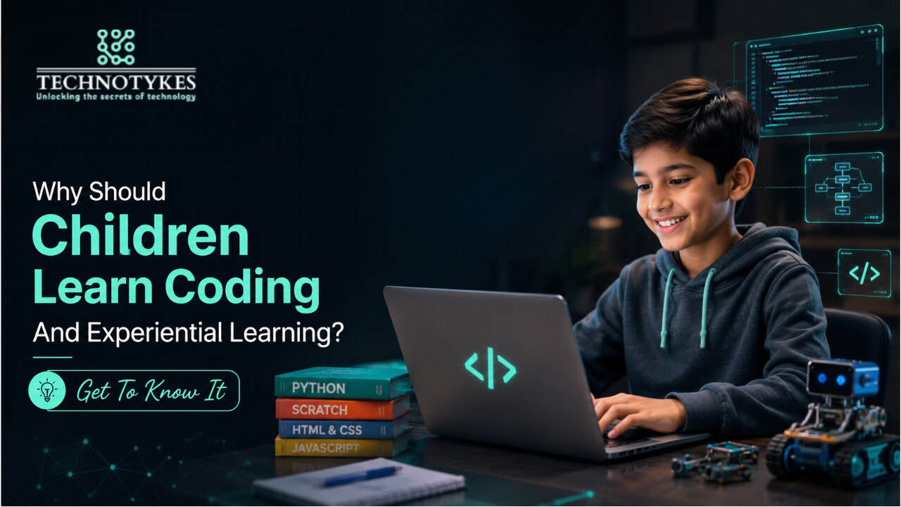 Child coding on a laptop with coding books and robot toys at Techno Tykes.
